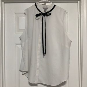 White and black sleeveless bow shirt